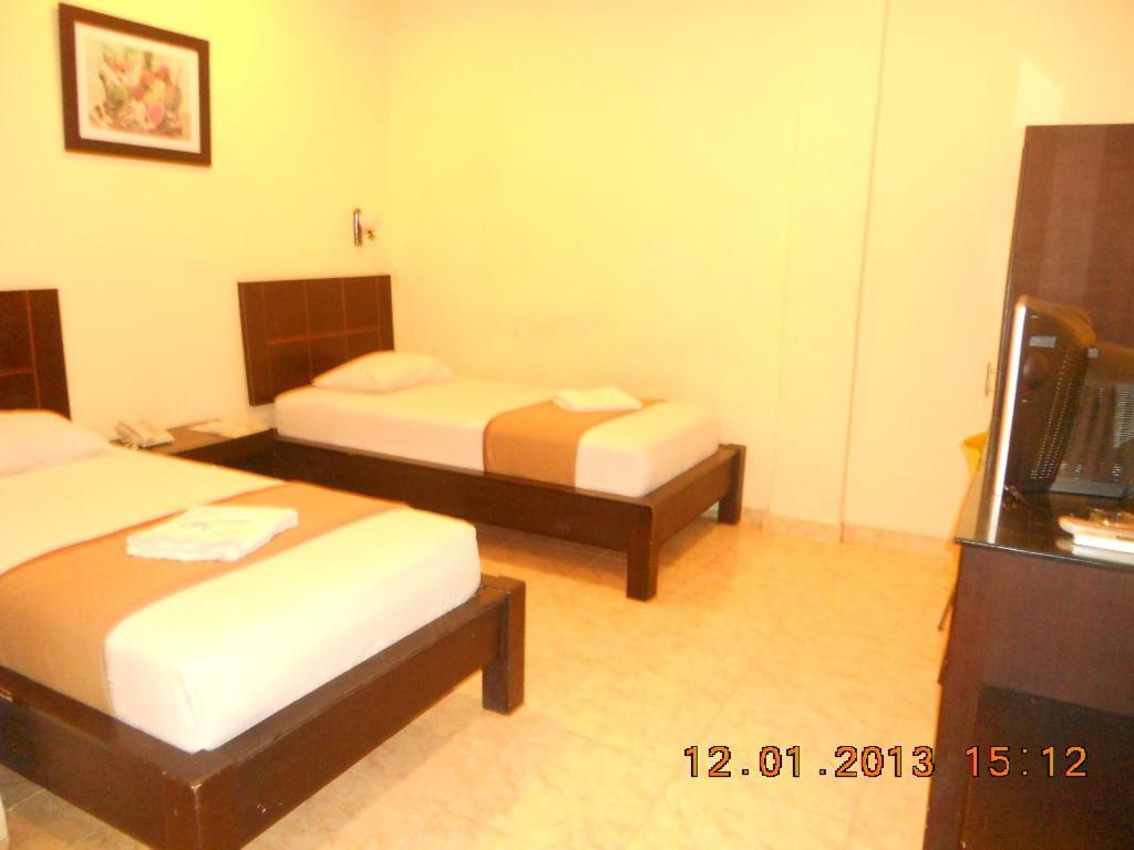 Parma Panam Hotel Pekanbaru Δωμάτιο φωτογραφία